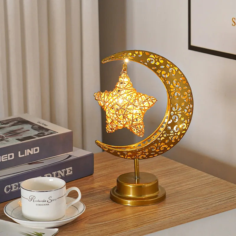 Crescent with hanging pendant LED light