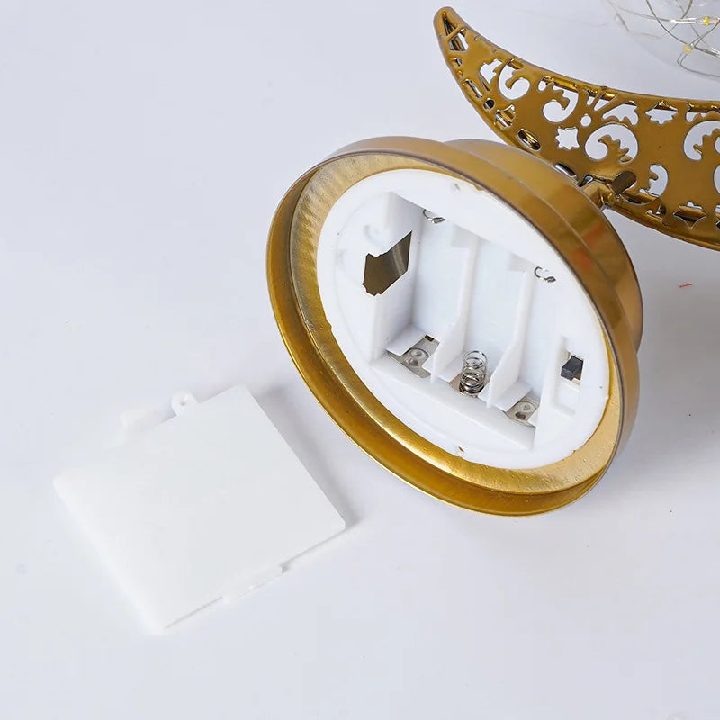 Crescent with hanging pendant LED light